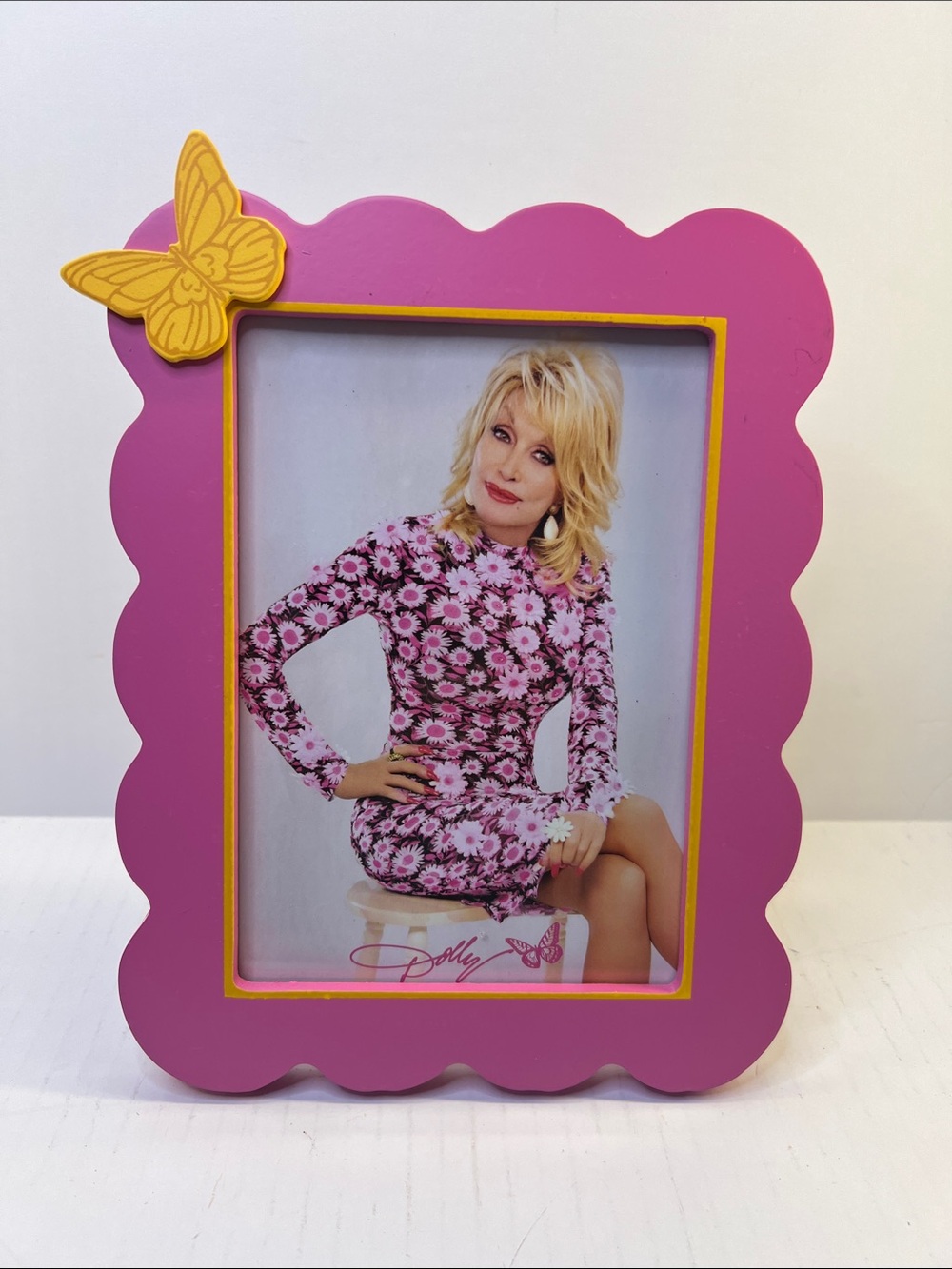 Dolly Parton Bright Pink Frame with Yellow Butterfly Accent. 5x7. Comes with pic
